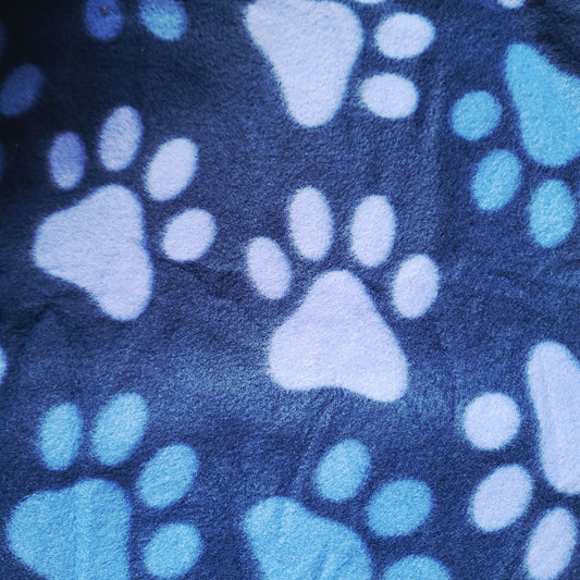 mainstay 50x60 fleece blanket for dogs or cats in blue paw print available at Personallypaws